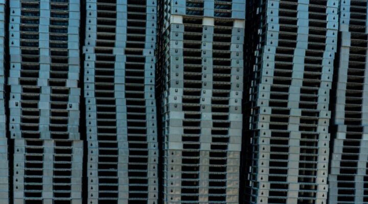 Heavy-duty storage crate strapped and ready for use on a mining site