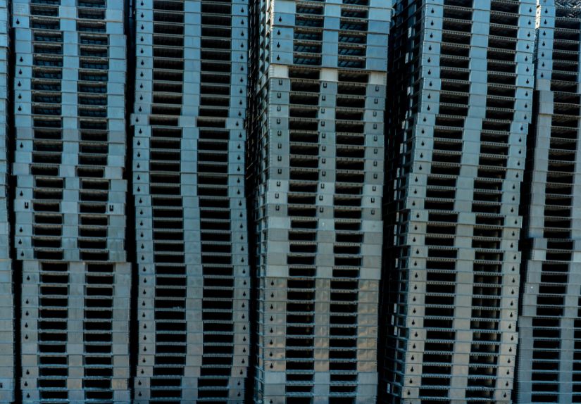 Heavy-duty storage crate strapped and ready for use on a mining site